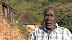 Everisto Gambire, whose home was totally destroyed by Cyclone Idai, fears the natural disaster might hit the area again. (Photo by C. Mavhunga/VOA)