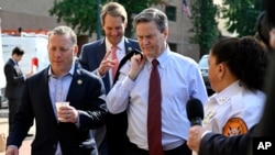 U.S. Representatives Josh Gottheimer, Jim Himes and Donald Norcross arrive at Democratic National Committee headquarters to discuss the 2024 election and President Joe Biden's candidacy, July 9, 2024, in Washington. Six of 213 House Democrats have said Biden should drop his bid.