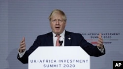 British Prime Minister Boris Johnson delivers a speech during the Opening Plenary session of the UK Africa Investment Summit in London, Jan. 20, 2020. 