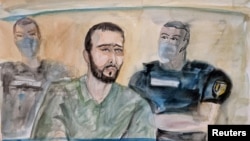 An artist's sketch shows Salah Abdeslam, one of the accused of the group suspected of carrying out the attacks, during the verdict in the trial of the Paris' November 2015 attacks at the Paris courthouse on the Ile de la Cite in Paris, France, June 29, 2022
