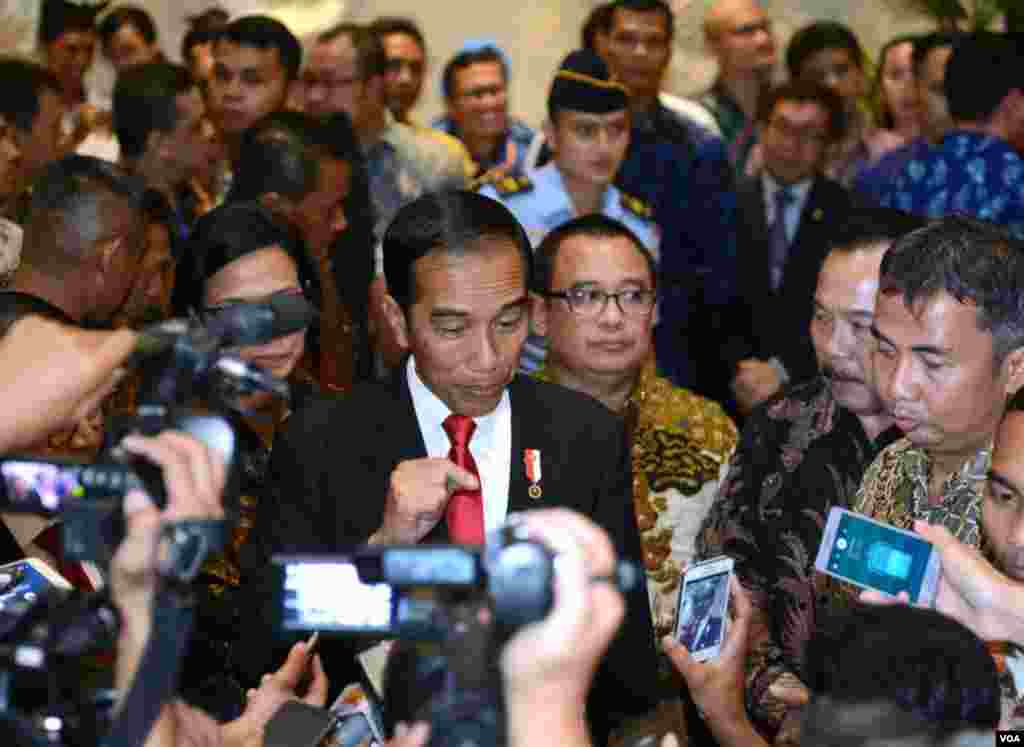 Presiden Joko Widodo memberikan keterangan mengenai penanganan gempa Aceh di Bali Nusa Dua Convention Center (7/12).