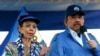 ARCHIVO - El presidente de Nicaragua, Daniel Ortega, y su esposa, la vicepresidenta Rosario Murillo, encabezan una manifestación en Managua, Nicaragua, en septiembre de 2018. 