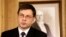 Latvia's Prime Minister Valdis Dombrovskis speaks during a news conference in Riga, Nov. 27, 2013. 