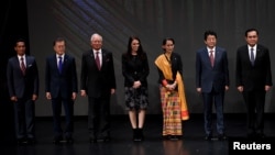 Japan's Prime Minister Shinzo Abe stands for photo with fellow Southeast Asian leaders at the 31st ASEAN Summit, in Manila, Philippines. Japan is seeking to increase ties in the region. (REUTERS/Noel Celis/Pool)