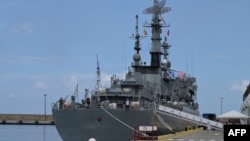 FILE - Russia's Baltic Fleet training ship Smolnyy is seen anchored at a dock at the port of La Guaira, La Guaira state, Venezuela, Aug. 6, 2024. The vessel was recently allowed to dock for several days at Cape Town harbor in South Africa.