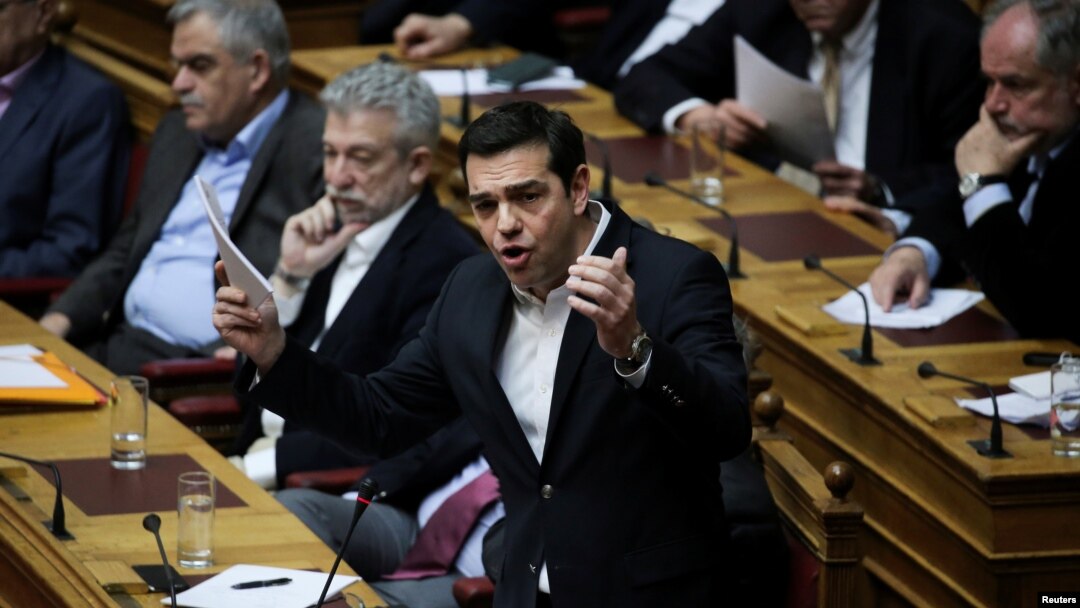 Greek Prime Minister Alexis Tsipras answers a question on the results of the latest Eurogroup during the Prime Minister's Question Time at the parliament in Athens, Greece, Feb. 24, 2017.