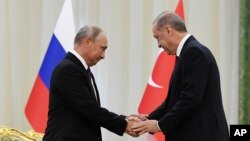 Cumhurbaşkanı Recep Tayyip Erdoğan ve Rusya Cumhurbaşkanı Vladimir Putin birarada.