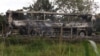 A burned bus is pictured after colliding with a trailer during its journey from Cancun to Tabasco near Escarcega, Campeche state in southern Mexico, according to local media, Feb. 8, 2025. 