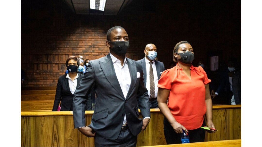FILE - Self-proclaimed prophet Shepherd Bushiri and his wife Mary, right, attend a bail application in the magistrates court in Pretoria, South Africa, Oct. 30, 2020.