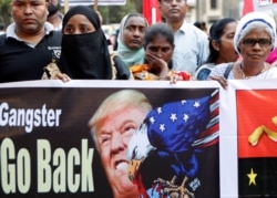 Supporters of the Communist Party of India-Marxist protest against the India visit of U.S. President Donald Trump in Mumbai, India, Feb 25, 2020.