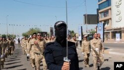 شبه‌نظامیان حشدالشعبی وابسته به جمهوری اسلامی در عراق.