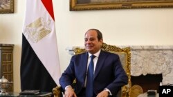 FILE — Egyptian President Abdel Fattah al-Sisi smiles during a meeting with U.S. authorities meets at al-Ittihadiya presidential palace, in Cairo, on January 30, 2024.