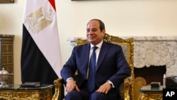 FILE — Egyptian President Abdel Fattah al-Sisi poses for a picture at the presidential palace in Cairo, on January 30, 2023. 