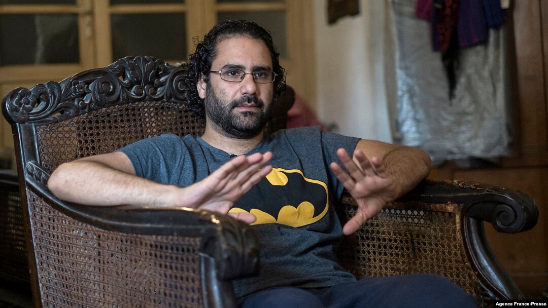 FILE - Egyptian activist and blogger Alaa Abdel Fattah gives an interview at his home in Cairo, Egypt, May 17, 2019. 