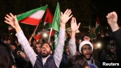 FILE—Iranian demonstrators react after the IRGC attack on Israel, during an anti-Israeli gathering in front of the British Embassy in Tehran, Iran, April 14, 2024.