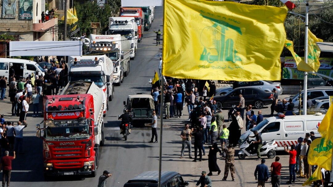 A convoy of tanker trucks carrying Iranian diesel crossed the border from Syria into Lebanon, arrive at the eastern town of el-Ain, Lebanon, Sept. 16, 2021. 