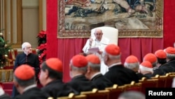 Pope Francis delivers the traditional greetings to the Roman Curia at the Vatican, December 21, 2023. The Vatican said Dec. 18, 2023, in a ruling approved by Pope Francis that Catholic priests can administer blessings to same-sex couples.