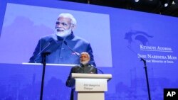 India's Prime Minister Narendra Modi delivers a keynote address at the opening dinner of the 17th IISS Shangri-la Dialogue, an annual defense and security forum in Asia, in Singapore, June 1, 2018, in Singapore. 