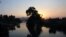 Sunset over the Mekong River from Don Khone where many locals fear they might be displaced if the dam at nearby Don Sahong goes ahead. (Luke Hunt for VOA News)
