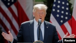 U.S. President Donald Trump takes questions during a joint news conference in the Rose Garden at the White House in Washington, June 24, 2020.