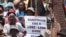 Zimbabweans march against targeted sanctions on the country’s leadership, in Harare, Oct. 25, 2019. (Columbus Mavhunga/VOA)