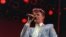 Rock star David Bowie performs on stage at Wembley Stadium, London, July 13, 1985, during the Live Aid famine relief rock concert. (AP Photo/Joe Schaber)