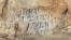 An inscription on the Manitou Cave wall, written in the Cherokee syllabary, identifies writers as stickball team leader and is dated April 30, 1828. Photo courtesy Beau Carroll, archaeologist, Eastern Band of Cherokee.