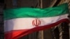 Bendera Iran terlihat berkibar di Tehran. (Foto: Reuters)