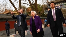 U.S. Treasury Secretary Janet Yellen and U.S. Ambassador to China Nicholas Burns, left, visit Guozijian Hutong alley in Beijing on April 8, 2024.