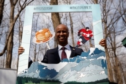 FILE - Canada's Immigration Minister Ahmed Hussen poses for photos following a citizenship ceremony at the Vanier Sugar Shack in Ottawa, Ontario, Canada, April 11, 2018.
