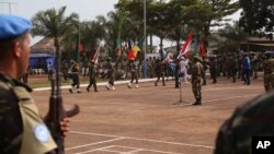 United Nations peace keeping troops take part in a ceremony in the capital city of Bangui, Central African Republic, Sept. 15, 2014.