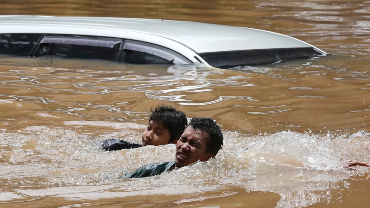 Thousands Evacuated Amid Floods In Indonesia's West Java