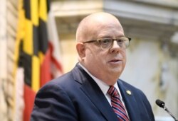 FILE - Maryland Gov. Larry Hogan speaks to lawmakers in Annapolis, Md., Feb. 5, 2020. He's one of several U.S. governors who have pledged to help resettle Afghan refugees in their states.