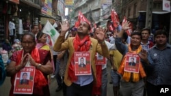 Candidates of Nepali Congress Party march during an election campaign event in Kathmandu, Nepal, May 11, 2017. Voters go to the polls this weekend to choose local representatives for the first time since 1997.