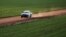 A farmer crosses his wheat crop at a farm in Condobolin, 285 miles (489 km) west of Sydney, July 5, 2011. 