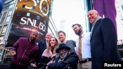 Current and former SNL cast members ring the opening bell in honor of “Saturday Night Live’s” 50th Anniversary at the Nasdaq Market in New York Feb. 14, 2025.