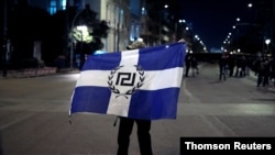 Golden Dawn, known for its militaristic rallies featuring flaming torches and Nazi salutes, saw its support in Sunday's election tumble to 2.9 percent.