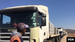 Wisiso Balathi tells of their frustrations despite the essential service truckers provide. (Mqondisi Dube/VOA)