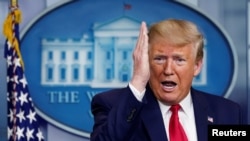 President Donald Trump addresses the daily coronavirus task force briefing at the White House in Washington, April 6, 2020.