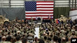 FILE - In this Dec. 24, 2017 photo, Gen. Joseph Dunford, chairman of the Joint Chiefs of Staff speaks during a ceremony on Christmas Eve at Bagram Air Base, in Afghanistan.