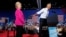 President Barack Obama points to Democratic presidential candidate Hillary Clinton during a Clinton campaign event in Charlotte, North Carolina, July 5, 2016. 