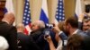 US Activist Forcibly Removed Prior to Trump-Putin Press Conference