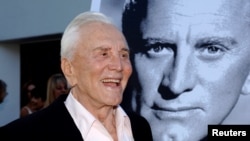 FILE - Actor Kirk Douglas arrives to receive an award for excellence in film presented by the Santa Barbara International Film Festival in Santa Barbara, Calif., July 30, 2006.