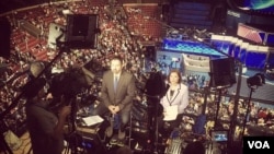 VOA Serbian's Bratislav Djordjevic (L) and VOA Spanish's Lina Correa (R) reporting from the DNC. 