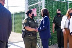 Vice President Kamala Harris talks to Gloria Chavez, Chief Patrol Agent of the El Paso Sector, as she tours the U.S. Customs and Border Protection Central Processing Center, in El Paso, Texas, June 25, 2021.