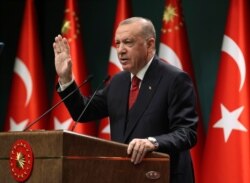 Turkey's President Recep Tayyip Erdogan speaks in a televised address in Ankara, Sept. 21, 2020.