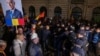 Supporters of far-right candidate Calin Georgescu gather outside Romania's central electoral bureau, after the rejection of his candidacy for the May presidential ballot re-run, in Bucharest, March 9, 2025. 