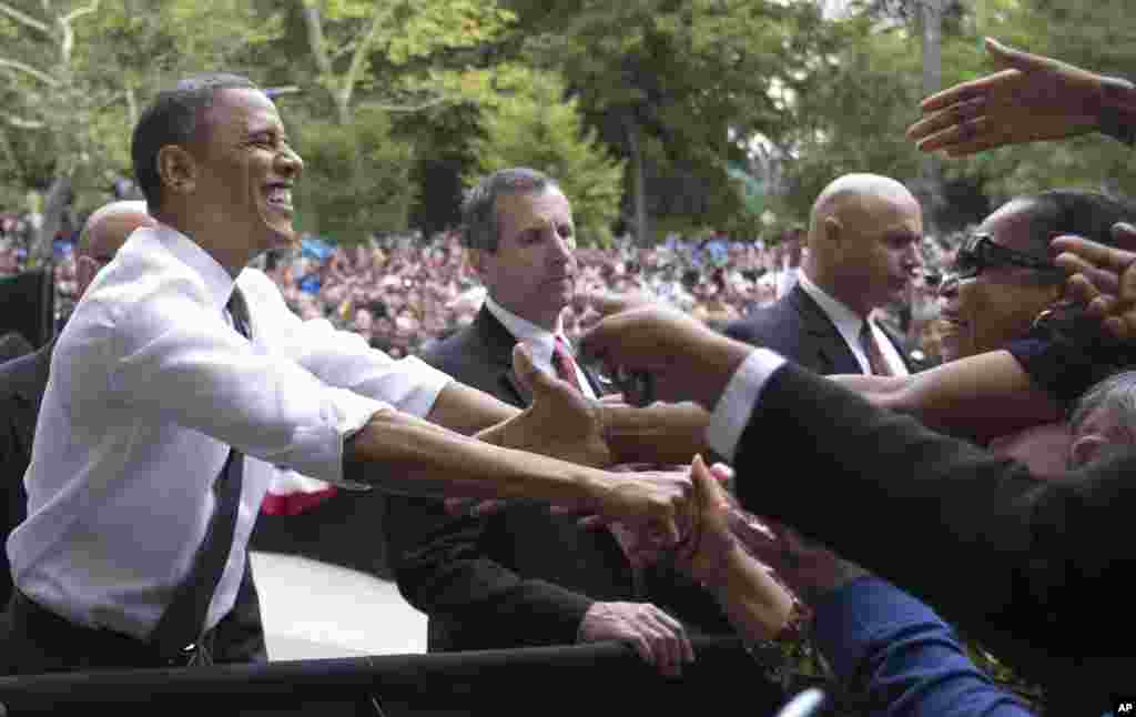 President Barack Obama greets people after speaking at a campaign event at Eden Park’s Seasongood Pavilion in Cincinnati, Ohio, Sept. 17, 2012. 