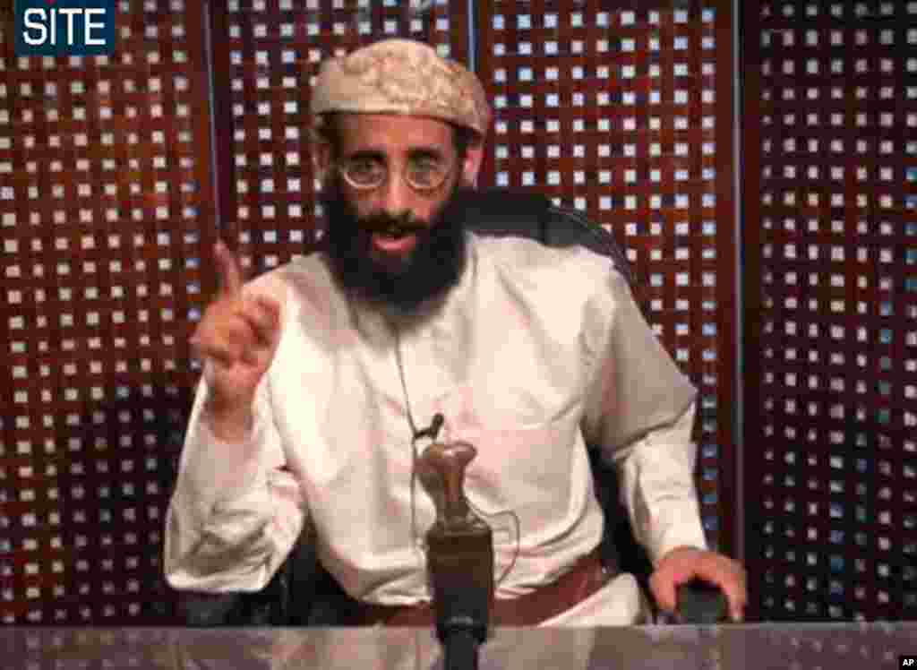 In this image taken from video and released by SITE Intelligence Group on Nov. 8, 2010, Anwar al-Awlaki speaks in a video message posted on radical websites. (Site Intelligence Group/AP)