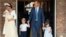 FILE - Britain's Prince William and Kate, Duchess of Cambridge with their children Prince George, Princess Charlotte Prince Louis as they arrive for Prince Louis' christening service at the Chapel Royal, St James's Palace, London, July 9, 2018.